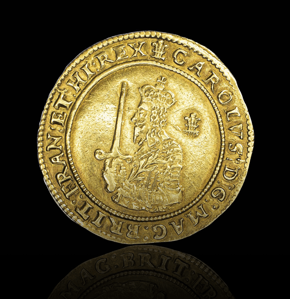 Charles I (1625-1649), Oxford mint, Triple Unite, 1643, mm. plume with bands on obv. only, bust left holding sword and olive